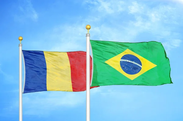 Romania Brazil Two Flags Flagpoles Blue Cloudy Sky Background — Stock Photo, Image