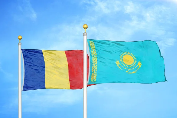 Romania Kazakhstan Two Flags Flagpoles Blue Cloudy Sky Background — Stock Photo, Image