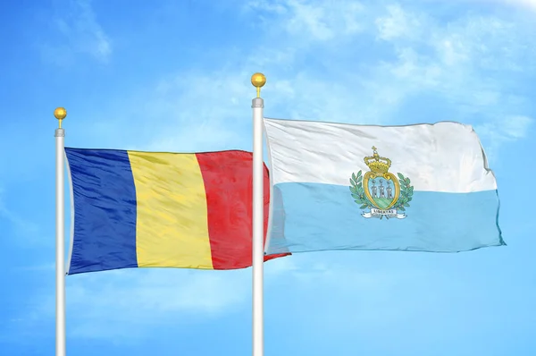 Roemenië San Marino Twee Vlaggen Vlaggenmasten Blauwe Bewolkte Lucht Achtergrond — Stockfoto