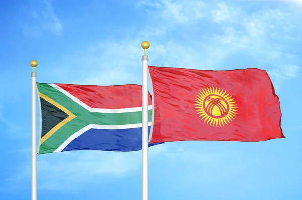 South Africa Kyrgyzstan Two Flags Flagpoles Blue Cloudy Sky Background — Stock Photo, Image