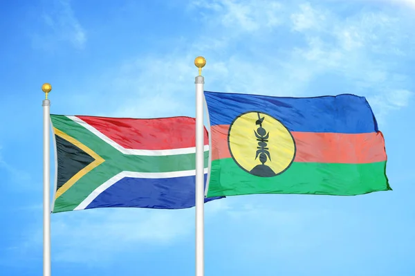 Sudáfrica Nueva Caledonia Dos Banderas Sobre Asta Bandera Fondo Azul —  Fotos de Stock