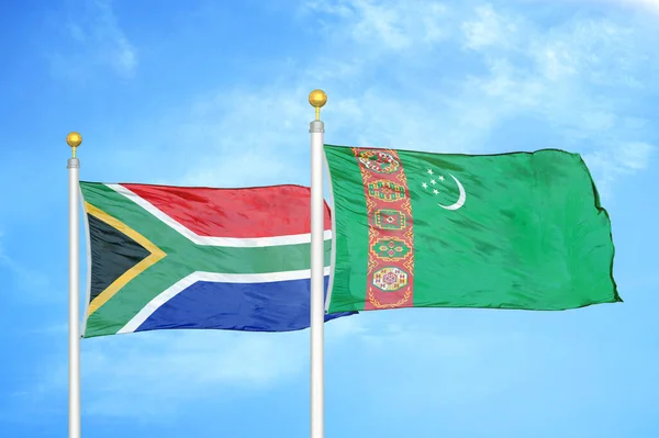 Sudáfrica Turkmenistán Dos Banderas Sobre Asta Bandera Fondo Azul Nublado —  Fotos de Stock
