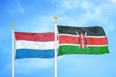 Hollanda ve Kenya bayrak direkleri ve mavi bulutlu arka planda iki bayrak