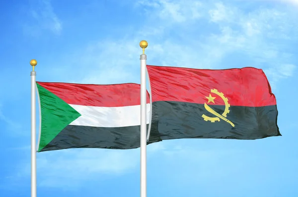 Sudão Angola Duas Bandeiras Postes Bandeira Céu Azul Nublado Fundo — Fotografia de Stock