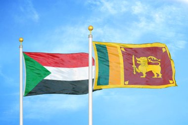 Sudan ve Sri Lanka bayrak direkleri ve mavi bulutlu arka planda iki bayrak