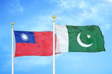 Tayvan ve Pakistan bayrak direkleri ve mavi bulutlu arka planda iki bayrak