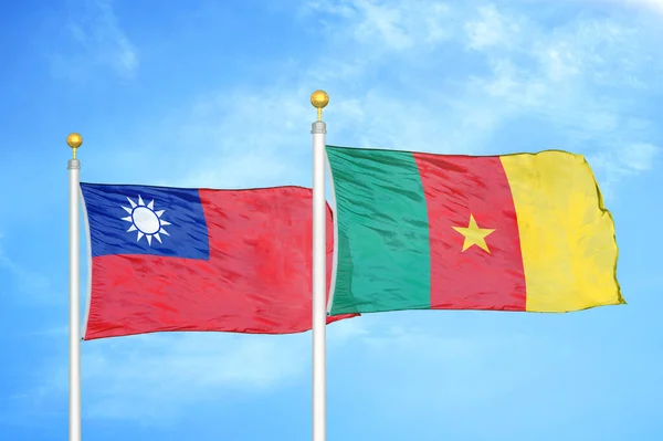 Taiwan Cameroon Two Flags Flagpoles Blue Cloudy Sky Background — Stock Photo, Image