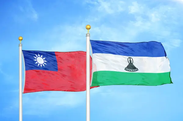 Taiwan Lesotho Two Flags Flagpoles Blue Cloudy Sky Background — Stock Photo, Image