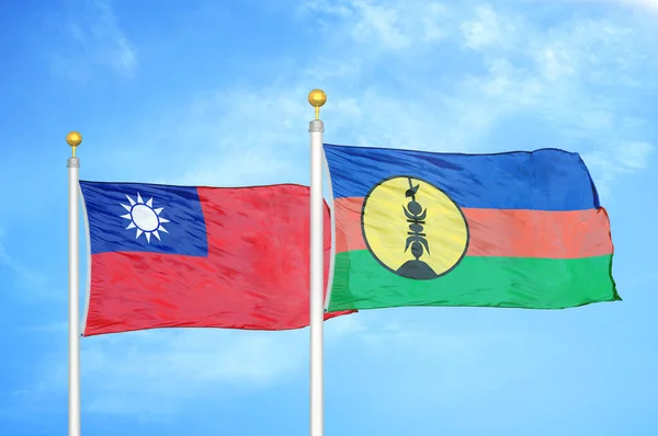 Taiwan New Caledonia Two Flags Flagpoles Blue Cloudy Sky Background — Stock Photo, Image