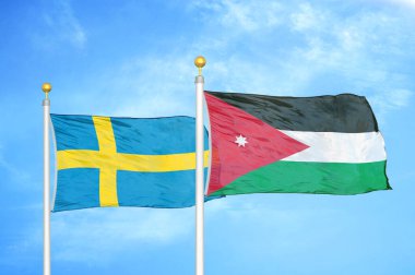 İsveç ve Ürdün bayrak direkleri üzerinde iki bayrak ve mavi bulutlu arka plan