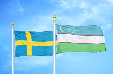 İsveç ve Özbekistan bayrak direkleri ve mavi bulutlu arka planda iki bayrak