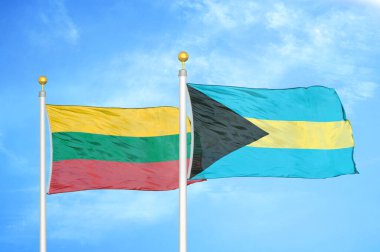 Litvanya ve Bahamalar bayrak direkleri ve mavi bulutlu arka planda iki bayrak