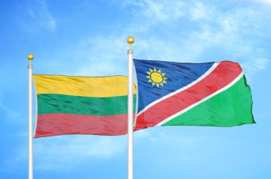 Litvanya ve Namibya bayrak direkleri üzerinde iki bayrak ve mavi bulutlu arka plan