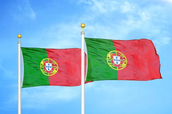 Portugal Two Flags Flagpoles Blue Cloudy Sky Background — Stock Photo, Image