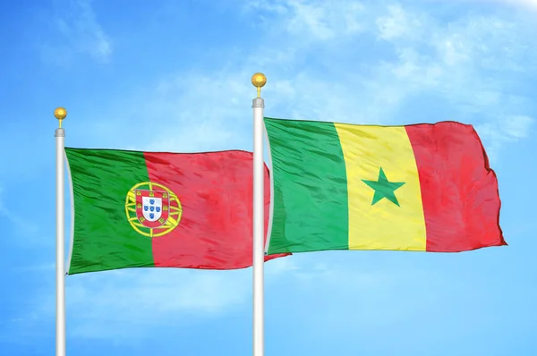 Portugal Senegal Dos Banderas Sobre Asta Bandera Fondo Azul Nublado — Foto de Stock