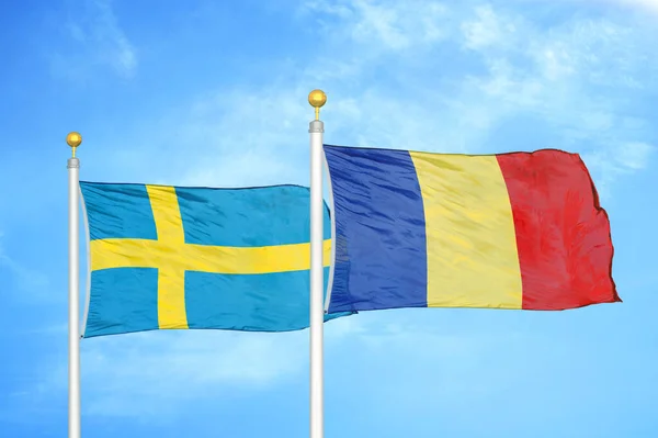 Zweden Roemenië Twee Vlaggen Vlaggenmasten Blauwe Bewolkte Hemelachtergrond — Stockfoto