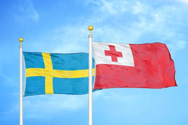 Sweden Tonga Two Flags Flagpoles Blue Cloudy Sky Background — Stock Photo, Image