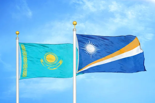 Kazakhstan Marshall Islands Two Flags Flagpoles Blue Cloudy Sky Background — Stock Photo, Image