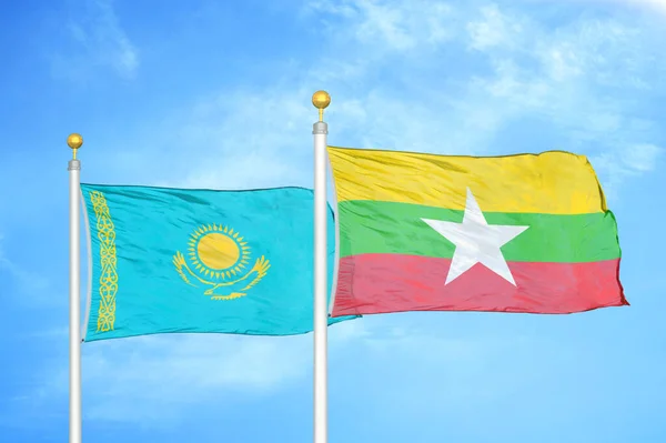 Kazakhstan Myanmar Two Flags Flagpoles Blue Cloudy Sky Background — Stock Photo, Image