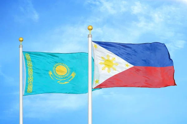 Kazakhstan Philippines Two Flags Flagpoles Blue Cloudy Sky Background — Stock Photo, Image