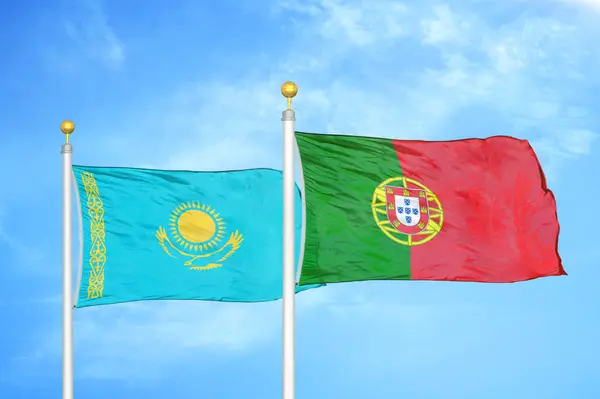 Kazakhstan Portugal Two Flags Flagpoles Blue Cloudy Sky Background — Stock Photo, Image