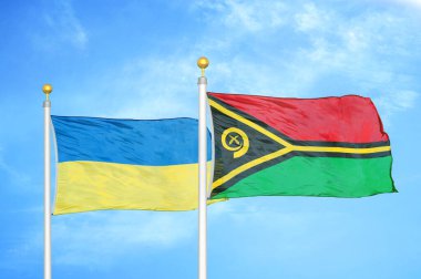 Ukrayna ve Vanuatu bayrak direkleri ve mavi bulutlu arka planda iki bayrak