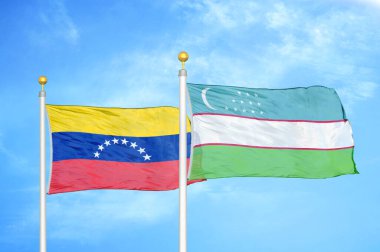 Venezuela ve Özbekistan bayrak direkleri ve mavi bulutlu arka planda iki bayrak