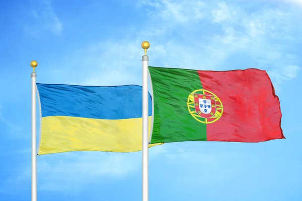 Ucrania Portugal Dos Banderas Sobre Asta Bandera Fondo Azul Cielo — Foto de Stock