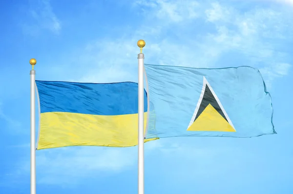 Ukrajna Saint Lucia Két Zászló Zászlórúd Kék Felhős Háttér — Stock Fotó
