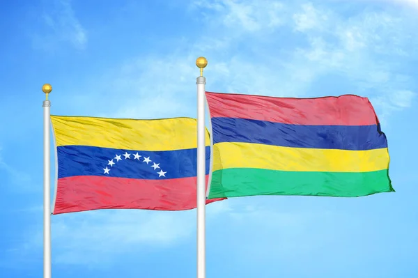 Venezuela Mauritius Two Flags Flagpoles Blue Cloudy Sky Background — Stock Photo, Image