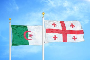 Cezayir ve Gürcistan bayrak direkleri üzerinde iki bayrak ve mavi bulutlu arka plan