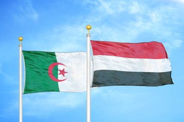 Cezayir ve Yemen bayrak direğinde iki bayrak ve mavi bulutlu arka plan