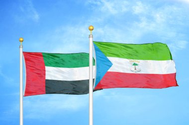 Birleşik Arap Emirlikleri ve Ekvator Ginesi bayrak direkleri üzerinde iki bayrak