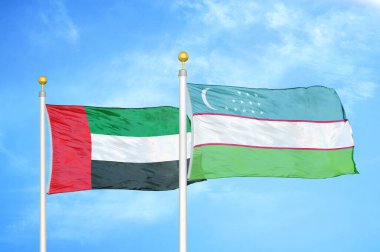 Birleşik Arap Emirlikleri ve Özbekistan bayrak direkleri üzerinde iki bayrak