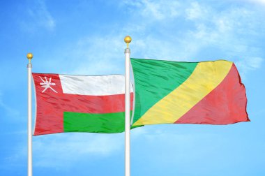 Umman ve Kongo bayrak direğinde iki bayrak ve mavi bulutlu arka plan