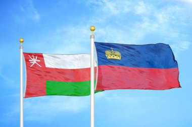 Umman ve Lihtenştayn bayrak direkleri ve mavi bulutlu arka planda iki bayrak