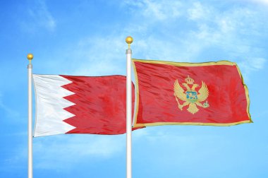 Bahreyn ve Karadağ bayrak direkleri ve mavi bulutlu arka planda iki bayrak