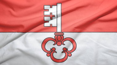 Kumaş dokusu arka planında İsviçre bayrağının obwalden kantonu