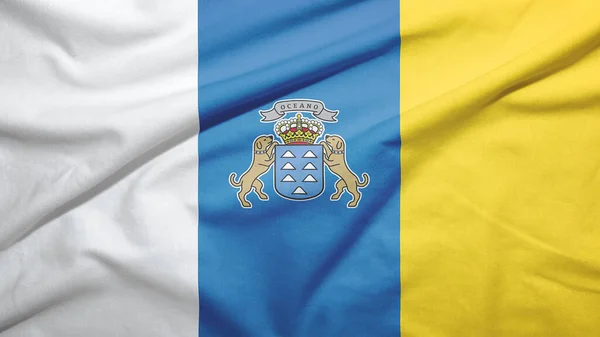 Canary Islands of Spain flag on the fabric texture background