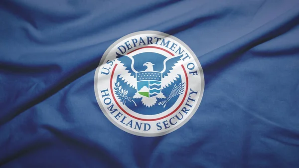 United States Department of Homeland Security flag on the fabric texture background