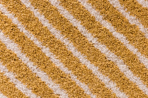 Patrón de rayas retro alfombra textil con colores amarillo y blanco — Foto de Stock