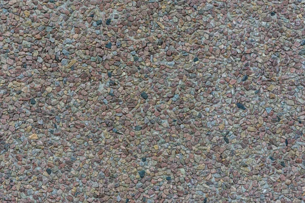Bakgrund gjord av en närbild av en hög av krossad sten — Stockfoto