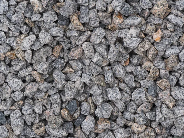 Achtergrond gemaakt van een close-up van een stapel van verpletterde steen — Stockfoto