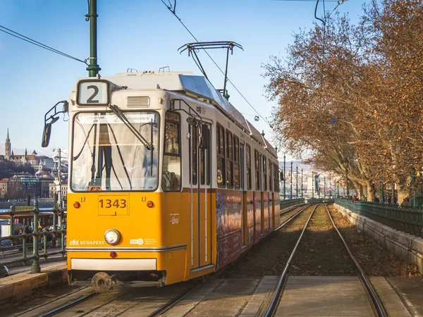 Budapest, Hungary - December 2018 : Tram way is popular transportation in Budapest run along Danube river connect many beautiful and historic place such The Parliament, Chain Bridge — Stock Photo, Image