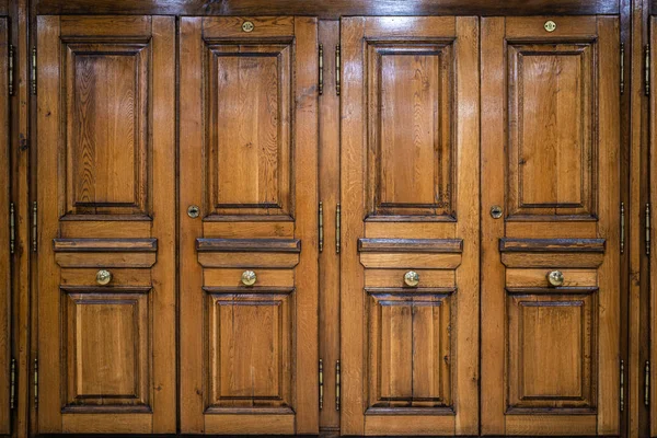 Image of brown ancient wooden four parts door — Stock Photo, Image