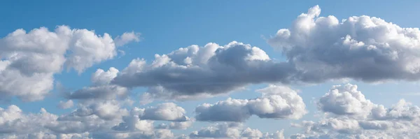 Beautiful panoramic pucture of bly sky with white clouds — Stock Photo, Image