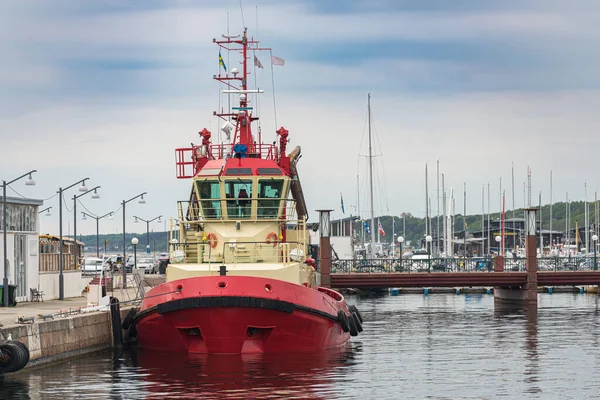 Picture of swedish military control boat parked in the pier. Protection of state borders from water.