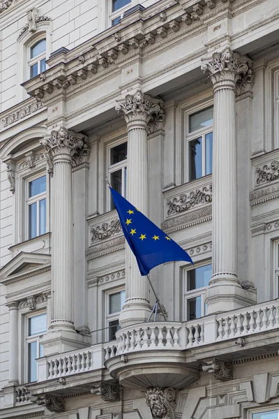 European Union flag on the old architecture building with columns