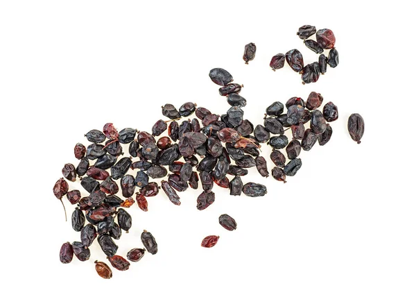 Dried aromatic barberry berries on white background, top view.