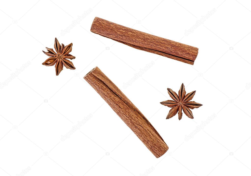 Anise and cinnamon isolated on white background, top view.